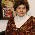 Milada Musilová v knihovně